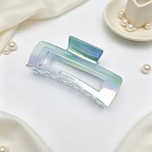 Close-up of iridescent UV electroplated large square hair claw clip with gradient AB color