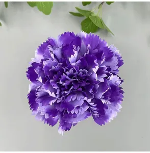 Macro view of ruffled purple artificial carnation flower head for wedding DIY decor