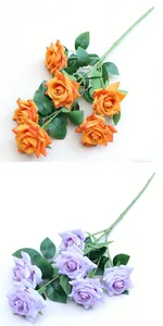 Top view of orange and lavender artificial multi-headed roses for home decoration.