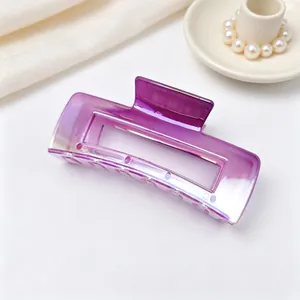 Macro detail showing the smooth purple gradient and UV electroplated finish of the square hair clip