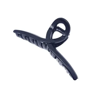 Detailed view of a high-quality 13cm black PC shark hair claw clip for thick hair