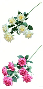 Detailed view of multi-head artificial roses in cream and pink for wedding decor.
