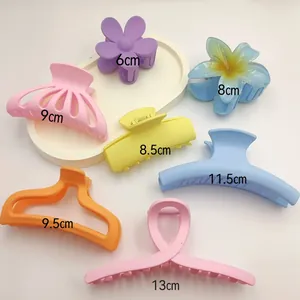 Variety of matte colorful hair claw clips in different shapes and sizes from 6cm to 13cm