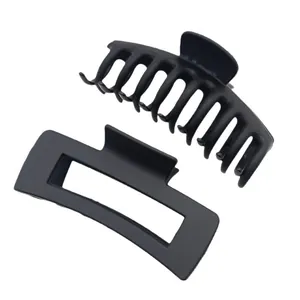 Set of 2 large matte black hair claw clips with ribbed and rectangular designs