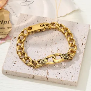 Close-up of vintage gold hip-hop bracelet with intricate dragon totem carvings