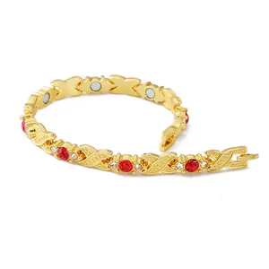 Elegant gold-plated magnetic health bracelet for women with red and white rhinestones