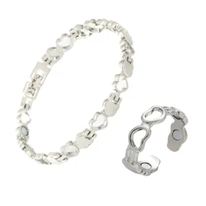 Detailed view of silver hollow heart magnetic bracelet and adjustable open ring set