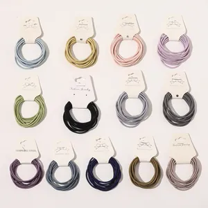 Assorted set of 13 multi-colored high elasticity thin hair ties on display cards