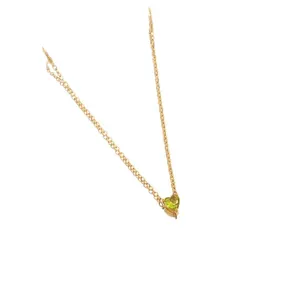 Gold stainless steel necklace featuring a heart-shaped peridot green birthstone pendant