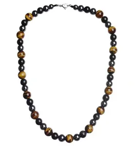 Detailansicht der dreifachen Schutzhalskette mit Tigerauge, Hämatit und Obsidian.