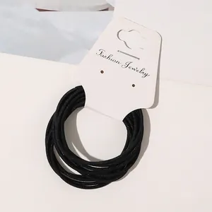 Durable high elasticity black hair ties set on a white fashion jewelry display card