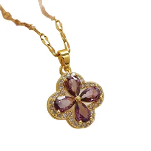 Elegant gold-plated necklace featuring a purple four-leaf clover flower crystal pendant