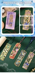 Detail view of hollow-out metal bookmarks with colorful floral patterns and silk tassels