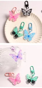 Vibrant acrylic butterfly keychains with matching metal clasps for bags and gifts