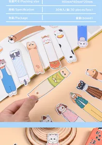 Detailed close-up of cute cartoon animal paper bookmarks featuring cat and dog designs