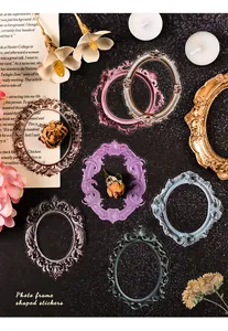 Detailed view of assorted vintage PET photo frame stickers in a rustic setting