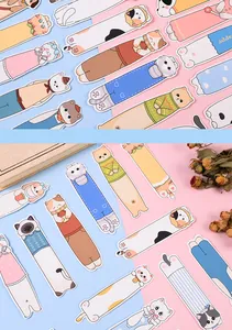 Detailed view of cute cartoon animal paper bookmarks featuring various cat and dog designs
