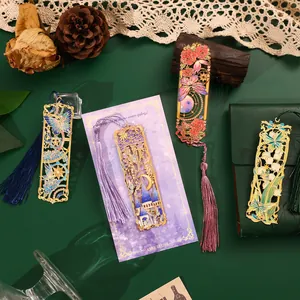 Set of 4 intricate vintage metal bookmarks with colorful enamel designs and tassels