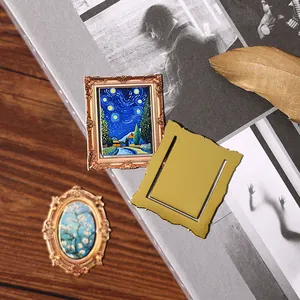 Vintage gold-plated metal bookmarks featuring classic oil painting art designs for readers.