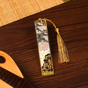 Elegant ancient style metal bookmark with golden tassel and traditional pine tree painting