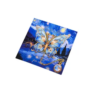 Exquisite blue butterfly metal bookmark with gold chain on Starry Night art card for gifts.
