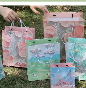 Detailed view of gift bags featuring artistic oil painting textures and patterns