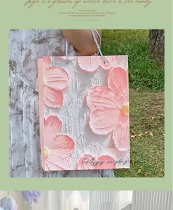 Elegant paper gift bag featuring a creative oil painting style pink flower pattern