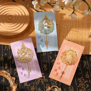 Elegant hollowed-out floral metal bookmark set with Chinese character charms and tassels