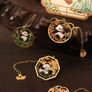 Detailed gold-tone metal panda bookmarks featuring enamel bamboo and peach designs