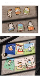 Close-up detail view of cute cartoon cat metal bookmarks with colorful themed background cards