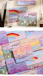 Detalle de tarjetas de felicitación estilo óleo con diseños de paisajes.