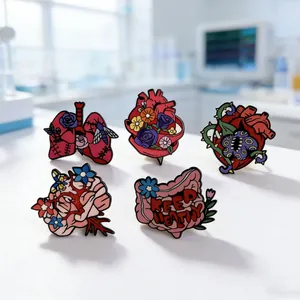 Creative floral human organ enamel pins set featuring artistic heart and brain designs
