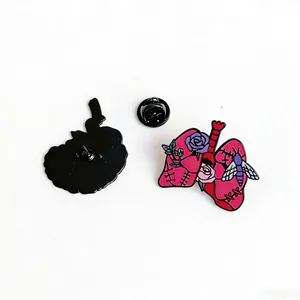 Detailed view of the anatomical lung enamel pin showing both front and back sides