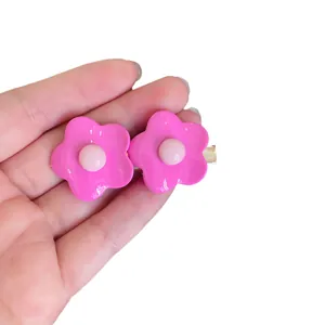 Cute candy-colored pink flower hair clips for girls, stylish summer hair accessory.