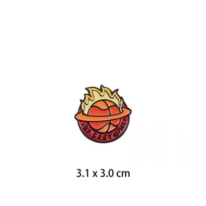Detailed close-up of a flaming basketball enamel pin badge showing dimensions 3.1x3.0 cm
