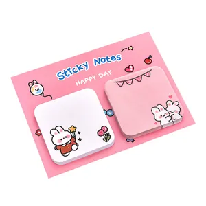 Set di foglietti adesivi con simpatici coniglietti su un cartoncino rosa decorativo