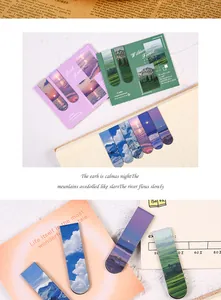 Macro detail showing magnetic bookmarks with beautiful scenic landscape photography.