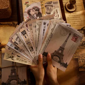 Vintage scrapbooking paper set with Eiffel Tower and old newspaper designs