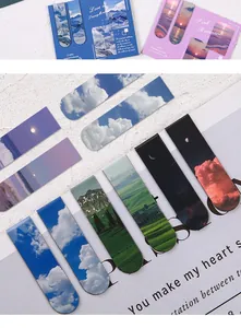Detail view of colorful magnetic bookmarks with scenic landscape prints on paper