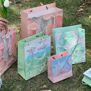 Creative oil painting style paper gift bags with handles in garden landscape designs