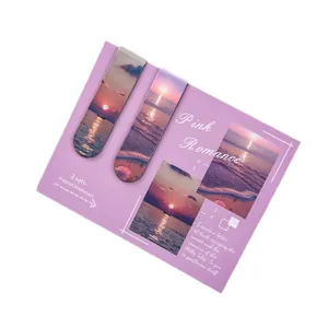 2-piece set of magnetic bookmarks featuring beautiful sunset and ocean scenery on a purple card