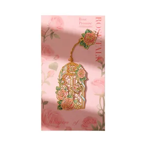 Elegant golden metal rose flower bookmark with pink enamel and intricate window design