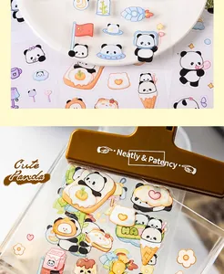 Detailed view of cute cartoon panda stickers on a transparent PET sheet for DIY journals