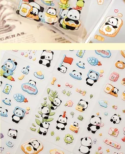 Macro view of transparent PET stickers featuring adorable cartoon panda characters for DIY