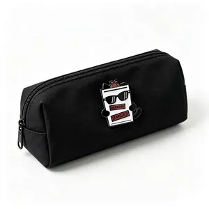 Detailed view of creative detective black cat metal pin on a canvas pencil case