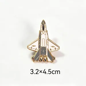 Detailed view of the 3.2x4.5cm fighter jet enamel pin featuring elegant gold plating