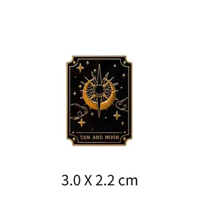 Macro view showing the 3.0 X 2.2 cm size of this tarot sun and moon enamel brooch