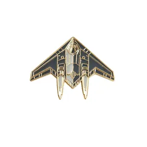 Large stealth fighter jet metal enamel pin badge with gold trim and military style decoration