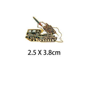 Detailed view of military mobile rocket launcher metal pin badge, dimensions 2.5 x 3.8 cm