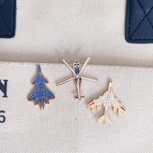 Military fighter jet enamel pins set featuring J-20 and Y-20 airplane designs